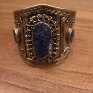 Large silver braclet with blue stones